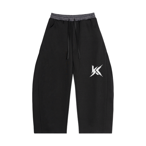 Black barrel sweatpants with contrast plaid waistband and KYRONIX logo