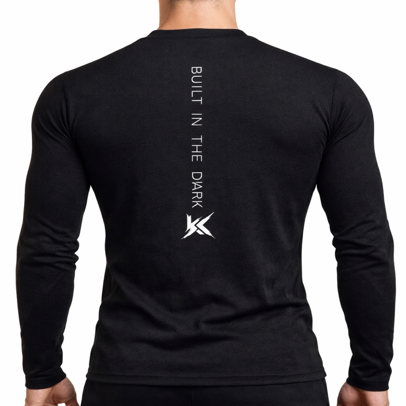 Black long-sleeve shirt with 'Built in the Dark' logo on the back