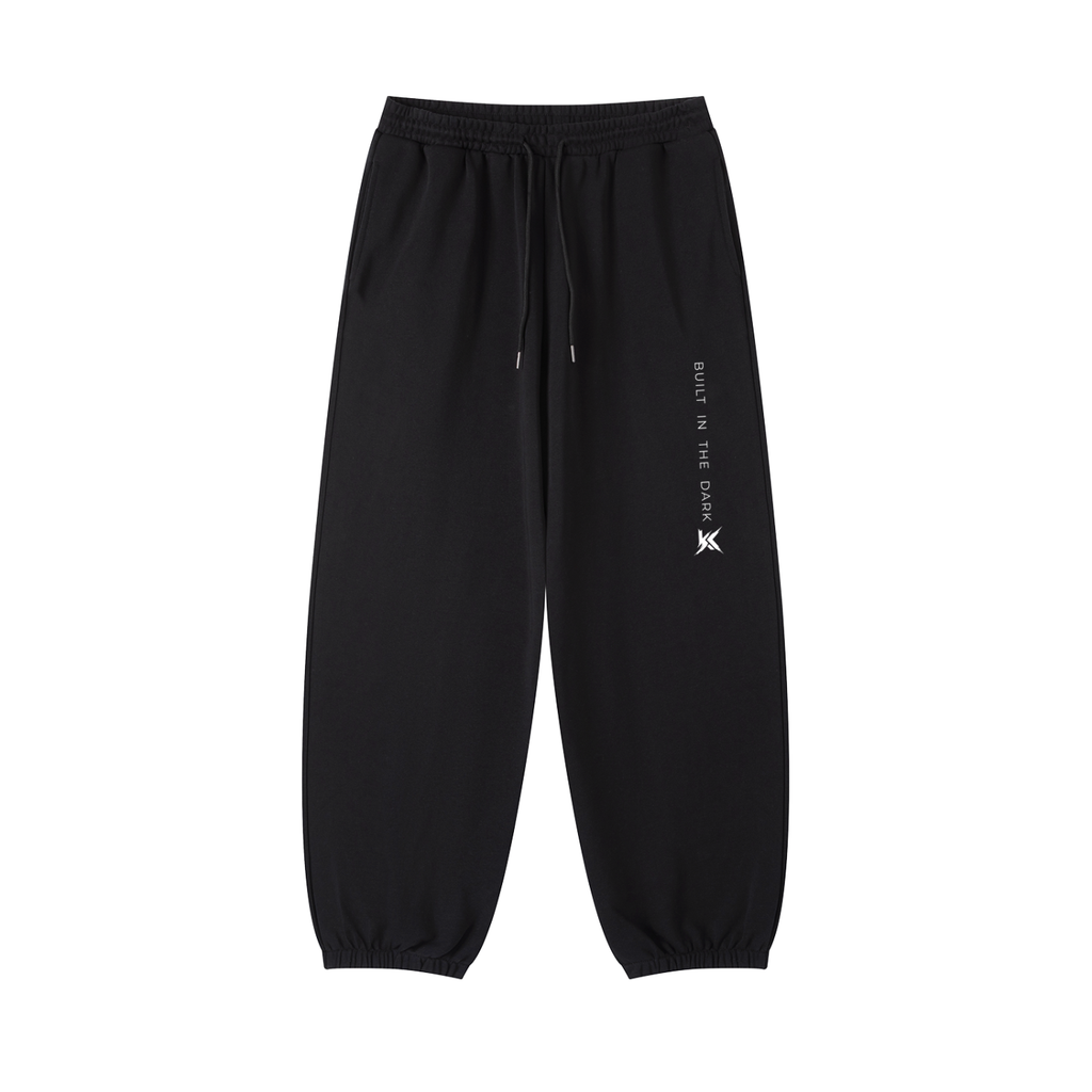 Black sweatpants with a KYRONIX logo on 